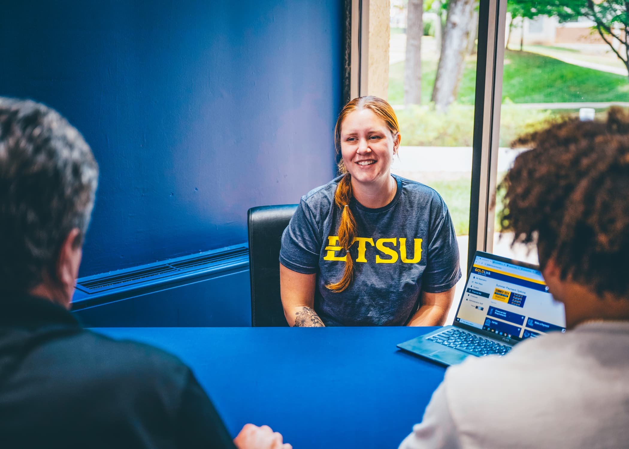 ETSU student reviewing financial aid options on the GOLDLink portal