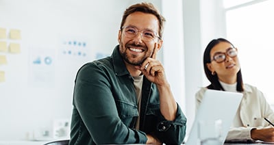 Two colleagues smiling